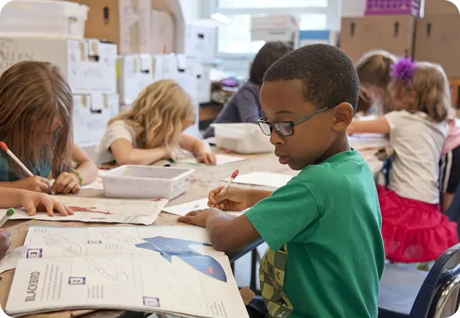Independent Educational Evaluation classroom setting with diverse students learning.